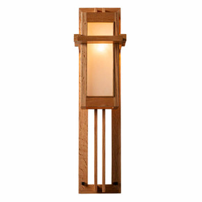  Front view of a Prairie School wall sconce with quarter-sawn oak frame in a natural blonde oak stain and frosted glass panels.