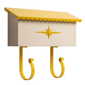  A midcentury ranch house style mailbox with a scalloped roof, starburst medallion and mustard yellow accents on the roof, medallion and magazine rack.
