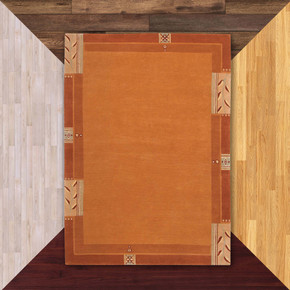  A rectangular, orange Prairie School rug with a grain pattern border. It's on a floor sample color background.