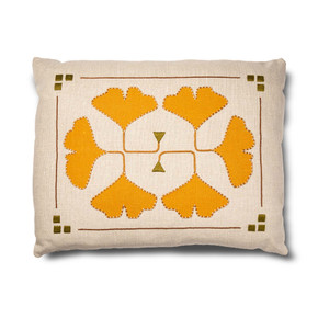  A light beige linen throw pillow featuring symmetrical embroidered artwork of orange ginkgo leaves.