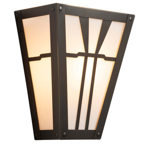  Three-quarters view of a shallow, angled or tapered flush mount wall sconce with an Arts & Crafts or Craftsman design to install in a home theater or game room. The fixture has an oil rubbed bronze finish and illuminated off-white glass.