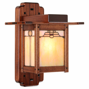  An authentic reproduction of the wall mounted sconce in the library of the Blacker House in Pasadena, California. The sconce has a 'beehive and tulip' design, golden glass and a wood body with ebony accents.
