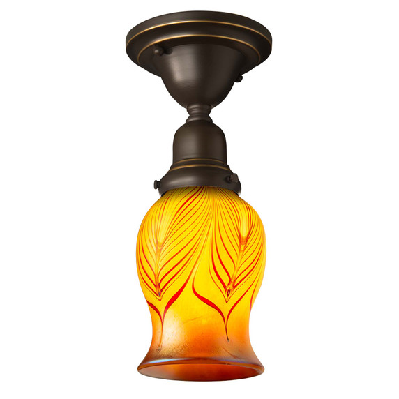  A traditional, Victorian transitional Craftsman style ceiling light fixture with an oil rubbed bronze finish. It shows an illuminated, tulip shaped blown glass shade featuring a red feather design.