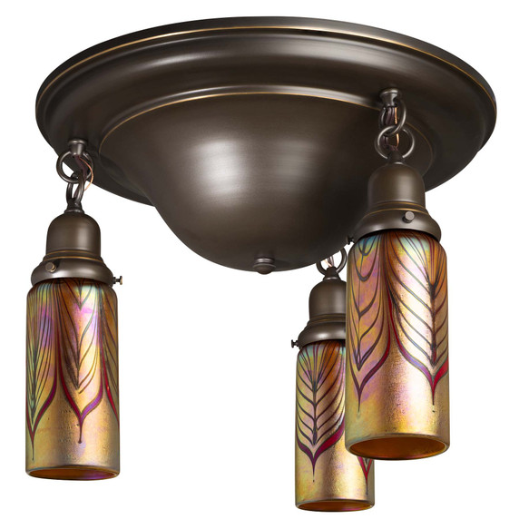  A traditional, Victorian or transitional Craftsman style ceiling light fixture with an oil rubbed bronze finish and three hanging lights. The lights have cylindrical blown glass shades with a red feather design.