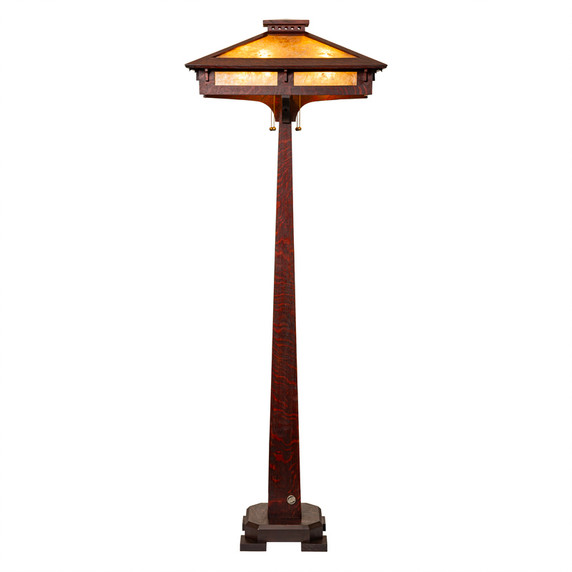  Illuminated prairie-style floor lamp showing warm amber glow through mica panels, highlighting the geometric structure and handcrafted quarter-sawn oak construction.
