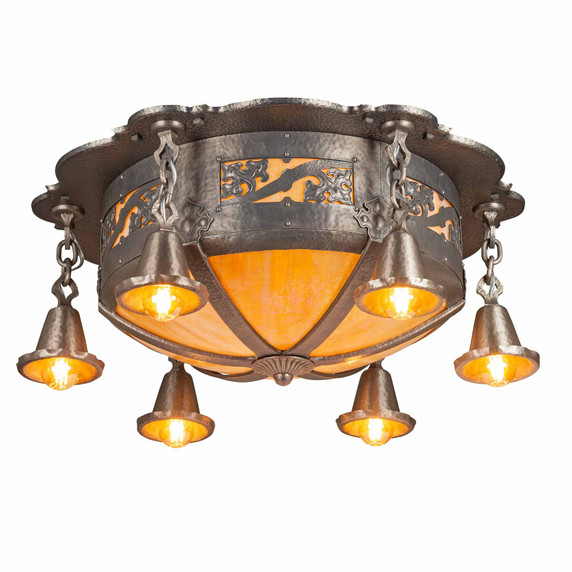  Illuminated Spanish Revival ceiling fixture with six Edison bulbs in pewter bell shades and central iridescent glass dome. Arts & Crafts lighting featuring hand-hammered metalwork with ornate scrollwork and warm amber illumination.