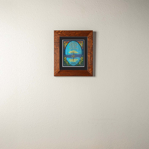  A vibrant artwork by Julie Leidel featuring a solitary tree with a vibrant yellow canopy on a rocky island in serene water, its reflection creating symmetry, backed by deep blue and purple silhouetted mountains, with the quote 