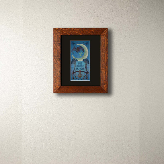  An archival print of a bat and crescent moon in a 2