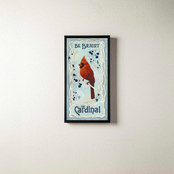 Art canvas print of a cardinal in the snow with a black float frame.