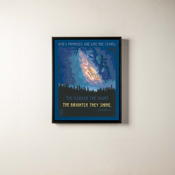  A canvas print of the Milky Way rising over a forest. It's in a black float frame.