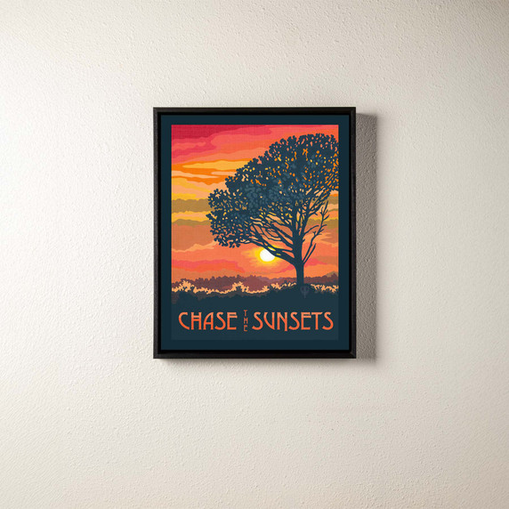  A canvas print of a tree in the sunset with a double mat and a black float frame. 