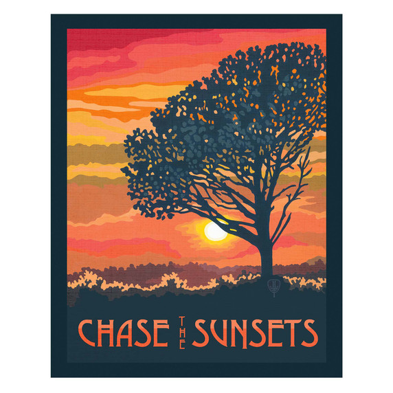  A bold silhouette of a tree stands against a vibrant orange and pink sunset over rolling hills. The design features the phrase “Chase the Sunsets” in warm, glowing tones. It has a canvas texture.