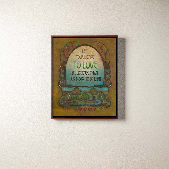  A canvas print of an inspirational quote about love. It's in a brown float frame.