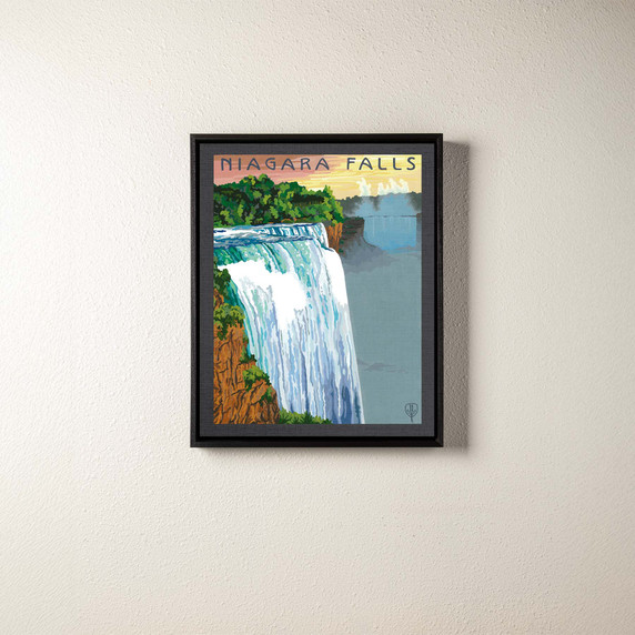  A canvas print of a painting of Niagara Falls. It's in a black float frame.