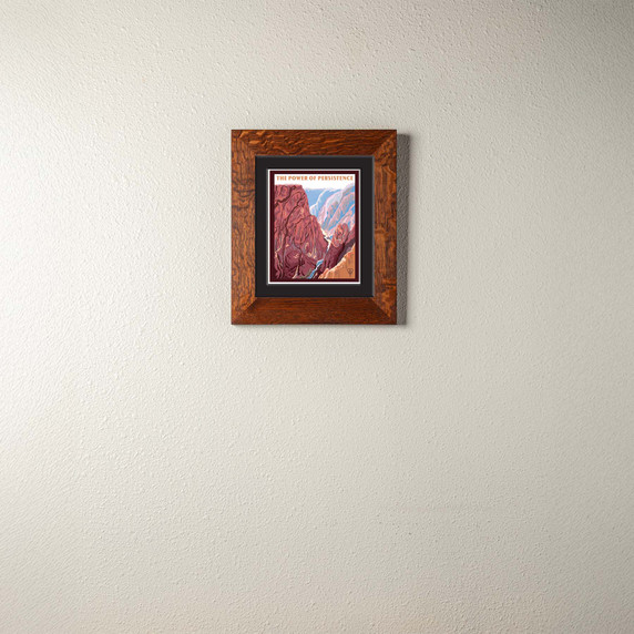  An archival print of a painting of a canyon and river. It has a double mat in a 2