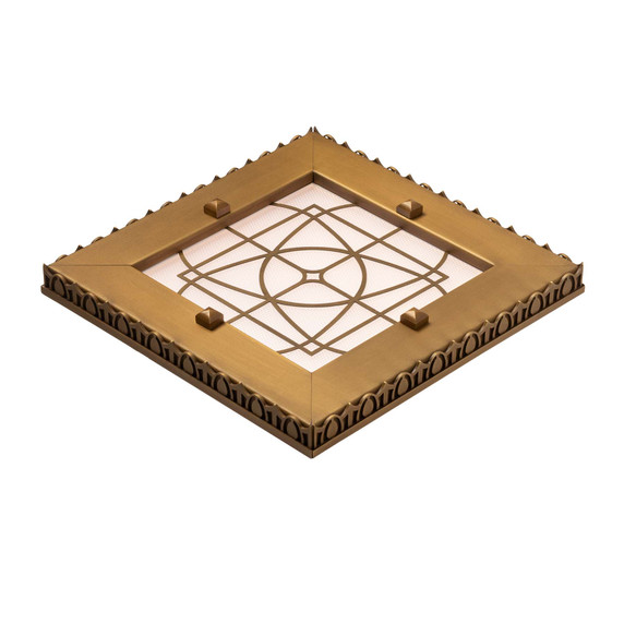  Three-quarters view of a square can or recessed light cover with an egg-and-dart pattern and filigree in an antique brass finish.