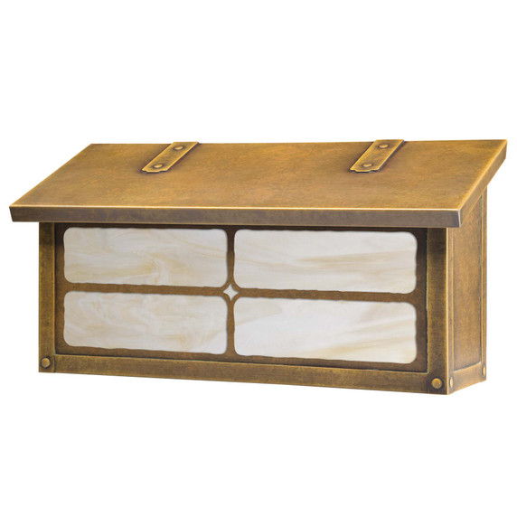  A solid brass, cottage or storybook style horizontal mailbox with a rustic window cross pattern, aged finish and off white glass.