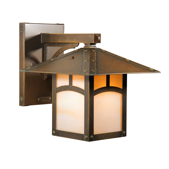  A linear, formal Craftsman straight arm wall sconce with bronze finish and warm glass. This Arts & Crafts fixture has a window pattern on the body.