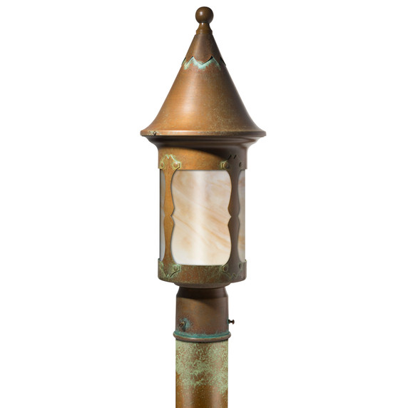  A Victorian, storybook lantern mounted on a brass post with an aging patina finish and creamy white glass.