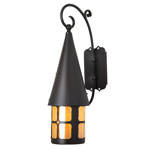  An asymmetrical, curvy wall mount lantern with an exaggerated roof and curlicue flourishes. The whimsical, storybook sconce has a black finish and warm glass.