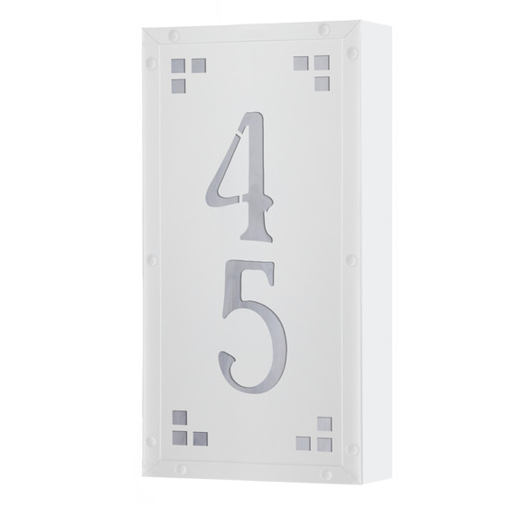  A solid brass, vertically oriented illuminated house number plaque with a two number address, a white finish, white glass and corner glass accents.