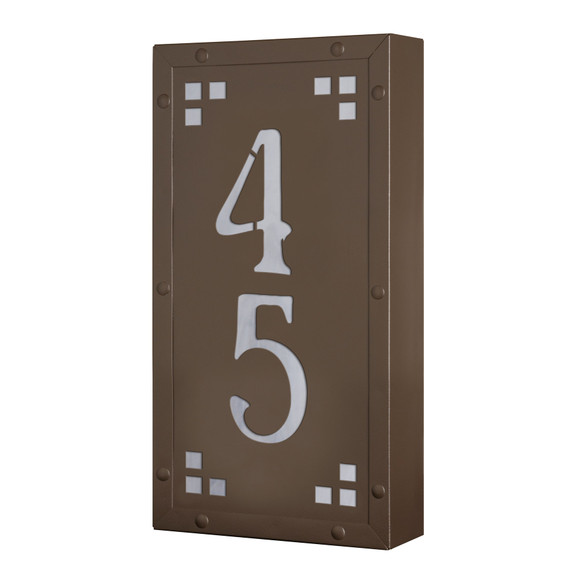  A solid brass, vertically oriented illuminated house number plaque with a two number address, a smooth bronze finish, white glass and corner glass accents.