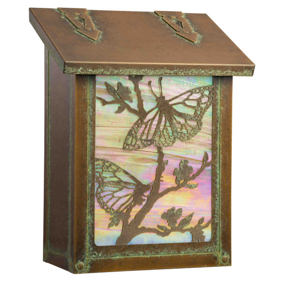  A solid brass, vertical mailbox with arrow hinge straps, an aged patina finish and butterfly artwork.