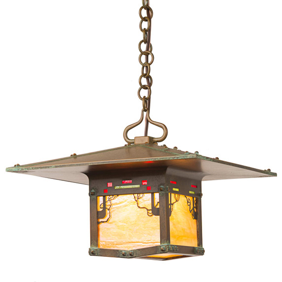  An authentic reproduction of the porte-cochere driveway lantern at the Blacker House in Pasadena, California. The lantern has an abstract vine design, aged patina finish and golden iridescent glass.