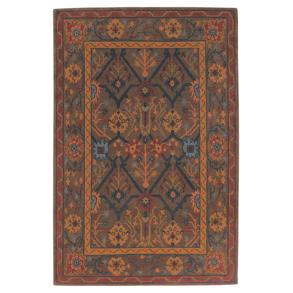  A Victorian or Arts & Crafts style rug with dominant muted greens and orange highlights. It is handmade by the artisans at Tiger Rug.