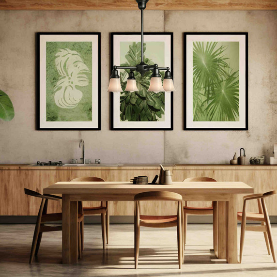  A reproduction Craftsman style bungalow chandelier light fixture with four lights on linear stems installed over a common dining area table. The chandelier has a satin black finish and tapered, milky-white glass shades. The lanterns are aimed downward.