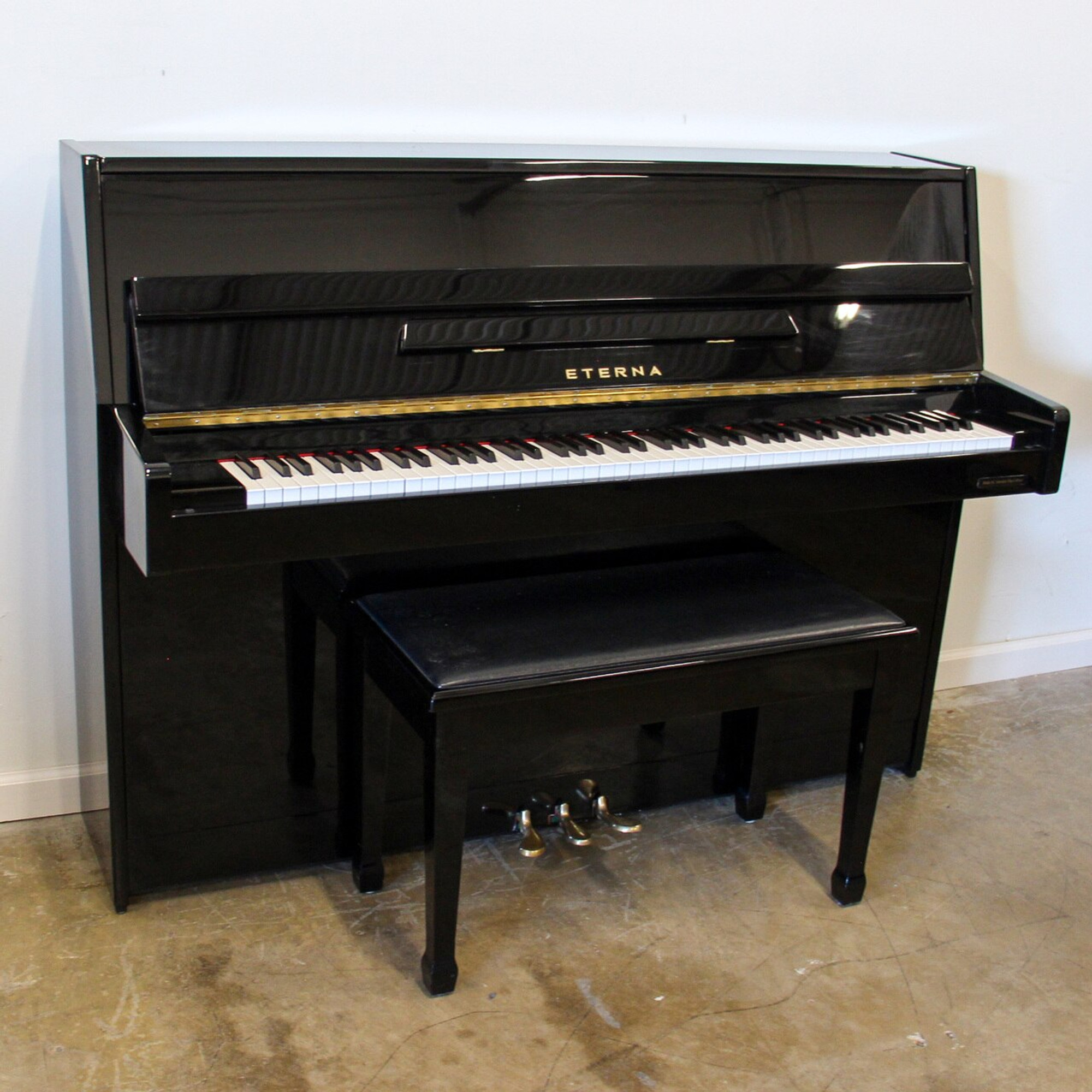 Eterna ER-C10 Polished Ebony Continental Console Piano