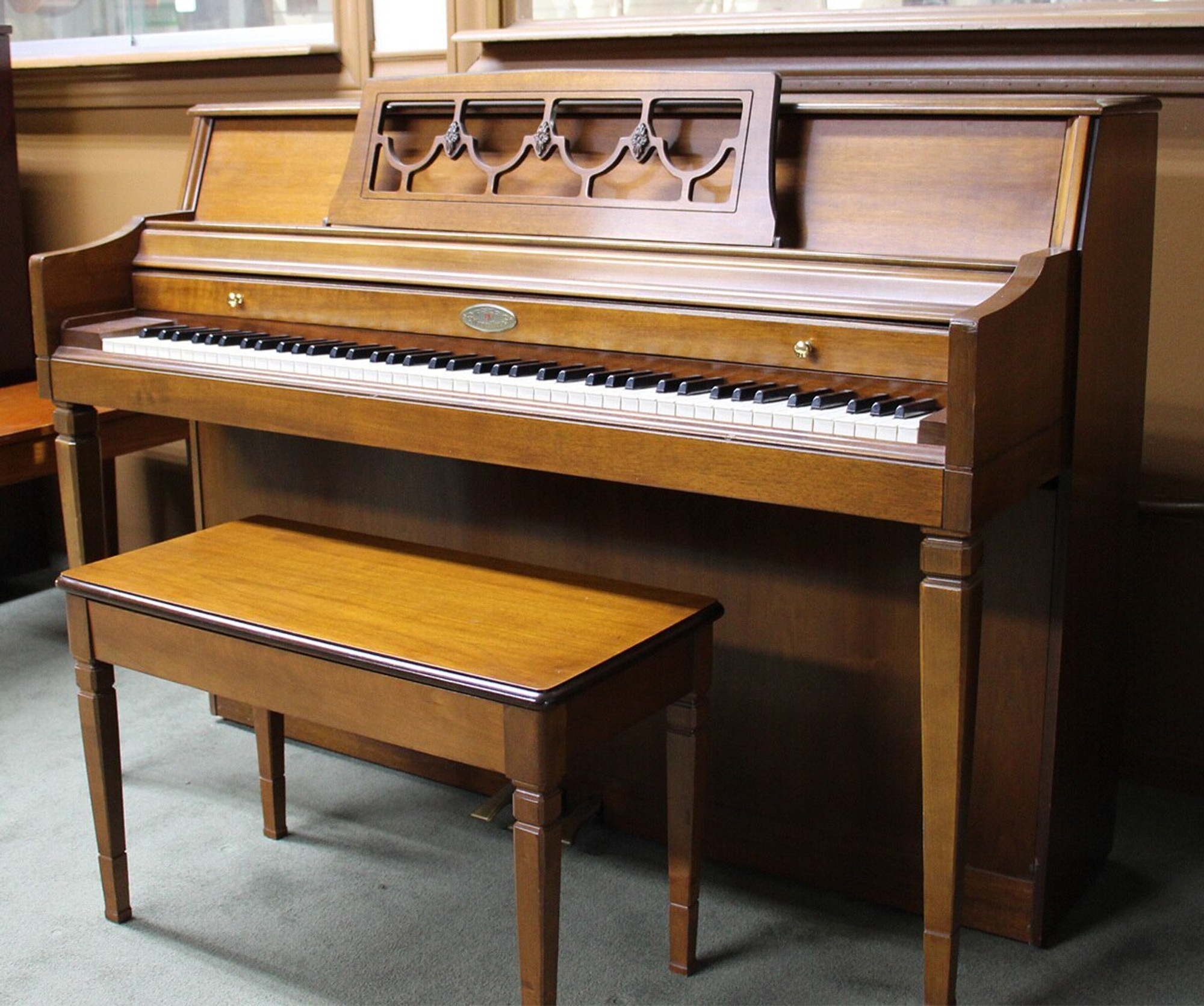 wurlitzer spinet piano.