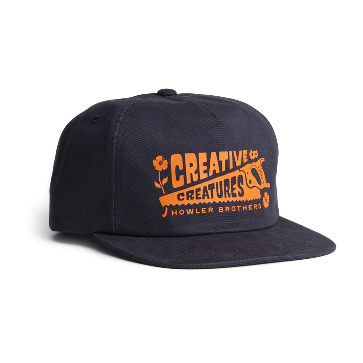 HOWLER BROTHERS- CC WORKSHOP UNSTRUCTURED SNAPBACK HAT IN NAVY