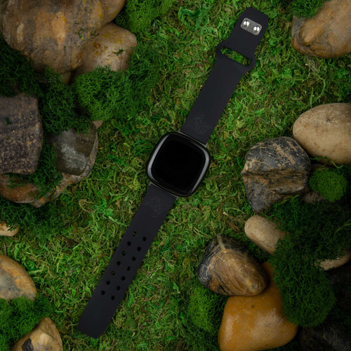 Image of Game Time Tampa Bay Buccaneers Engraved Silicone Watch Band Compatible with Fitbit Versa 3 and Sense (Black)