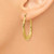 Image of 16mm 14K Yellow Gold Polished Twisted Oval Hollow Hoop Earrings