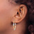 Image of 28mm 14K Yellow Gold with White & Pink Plating Satin Twisted Hoop Earrings TH756