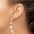Image of 56.9mm Sterling Silver Rhodium-Plated Polished with Discs Hoop Earrings Image of 56.9mm Sterling Silver Rhodium-Plated Polished with Discs Hoop Earrings