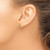 Image of 10.15mm 14K Yellow Gold Polished & Textured CZ Love Knot Earrings