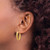 Image of 22.92mm 14K Yellow Gold Polished and Satin Diamond-cut Oval Hoop Earrings