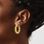 Image of 24.9mm 14k Yellow Gold Polished 5.3mm Hollow Twisted Round Hoop Earrings
