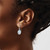 Image of 13.1mm Sterling Silver Polished Oval Blue Topaz Dangle Earrings