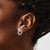 Image of Sterling Silver Rhodium-plated White Ice .09ctw Diamond Three Rings Post Earrings