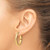 Image of 14K Yellow Gold Polished Diamond-cut Oval Hoop Earrings