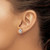Image of 11mm White Ice Sterling Silver Rhodium-plated Diamond Swirl Post Earrings QW480