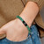 6.75 inch Stainless Steel Brushed Black IP-Plated White Enamel Medical ID 8.5mm Dyed Green Stone Beaded Stretch Bracelet