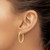 10K Yellow Gold Hollow Polished Diamond-Cut Oval Hoop Earrings, 26 mm - View 3