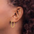 14K Yellow Gold Hollow Polished and Textured Hoop Earrings, 25 mm - View 3