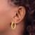 14K Yellow Gold Polished and Textured Twisted Tube Hoop Earrings, 23.5 mm - View 3
