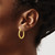 14K Yellow Gold Polished Twisted Round Hoop Earrings, 20 mm - View 3