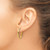 14K Yellow Gold Hollow Polished and Grooved Twist Oval Hoop Earrings, 23.5 mm - View 3